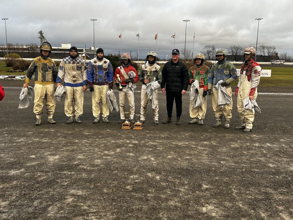 From left, Steven Shepherd, Adam Merner, Jason Hughes, David Dowling, Marc Campbell, Devin MacDonald, Gilles Barrieau, Corey MacPherson and Brady Sweet after the Paul MacDonald Memorial Driving Challenge. Red Shores Photo